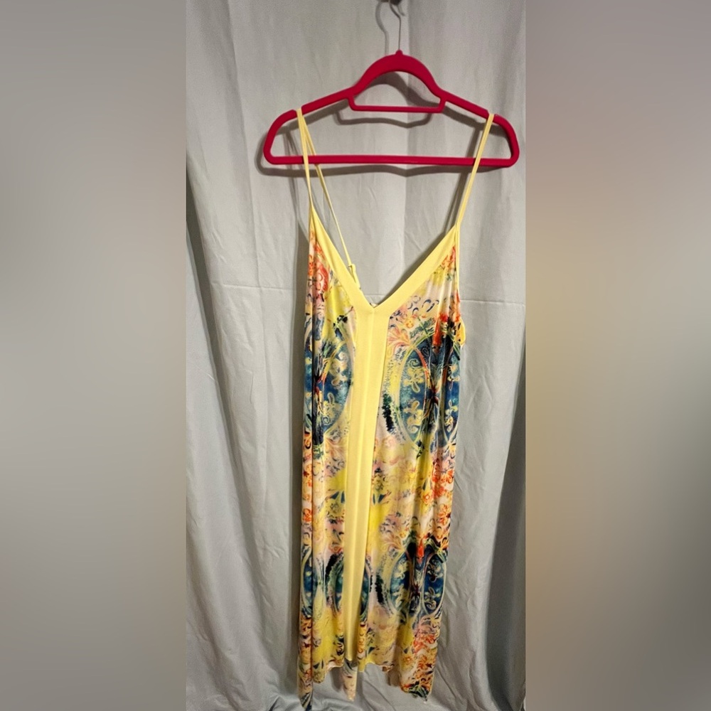 Plus size watercolor maxi handkerchief dress with spaghetti straps.